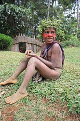 Boy with cap and paint Papua New-Guinea