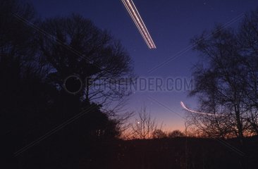 Broken trail of an airplane and Venus