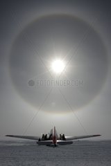 Sundog above a DC3 aircraft Antarctica