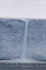 Brasvell glacier with a waterfall in Spitsbergen Norway