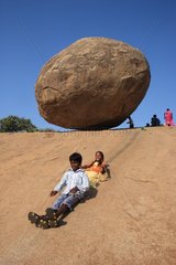 Children playing slide in Mamallapuram India