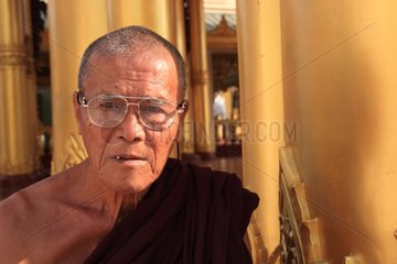Portrait of a monk at Shwedagon Pagoda in Burma
