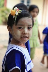 Girl in the courtyard of the kindergarten Burma