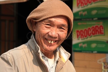 Portrait of a man with a radiant smile to Namshan Burma