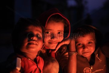 Portrait of children at night Lumbini Nepal