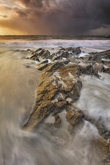 Rocky shore in the storm Britain France
