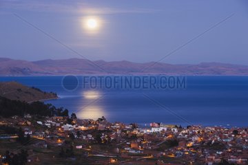 Full moon over Copacabana and Lake Titicaca Bolivia