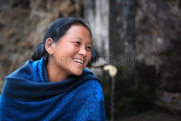 Portrait of woman wearing a blue shawl Syanje Nepal