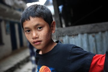 Portrait of boy in the street Syanje Nepal