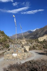 Masts prayer by the roadside Pisang Nepal Himalayas