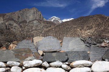 Flat stones written Braka Chulu Nepal Himalayas