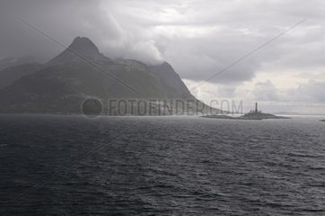 Lighthouse in a fjord in the Lofoten Islands Norway