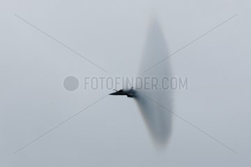 Plane crossing the sound barrier