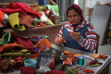 Woman cutting of felt Kathmandu Nepal