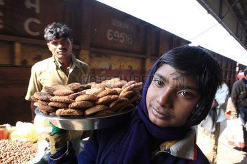Boy selling cakes Station Gaya Bodhgaya Bihar India