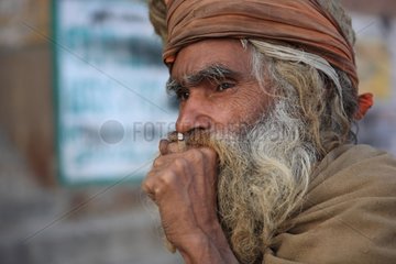 Portrait of elderly man smoking Varanasi India