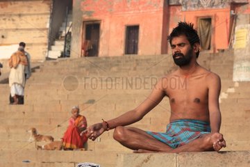 Man Contemplating Ghats Varanasi India