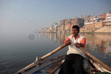 Man rowing on the Ganges Ghats Varanasi India