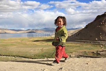 Girl walking Lake Tso Moriri Ladakh Himalayas India