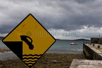 Traffic sign in a fishing port Ireland Achill island Irland