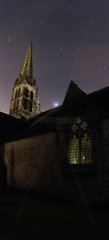Starry sky above a church in France Pluguffan