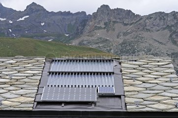 Lauze roof with solar panel heating Alps France