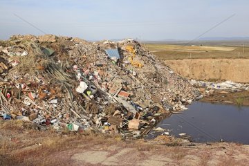 Garbage dump in a pool in Spain