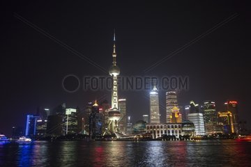 The Bund along the Huangpu river at night - Shanghai China