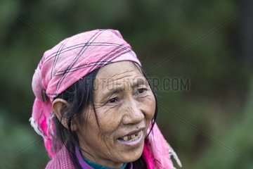 Portrait of peasant Han in red land - China