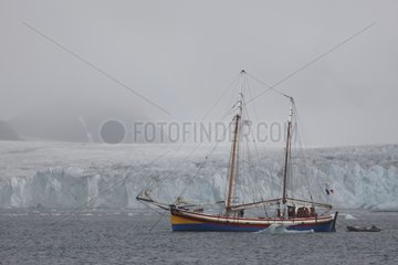 Boat Albarquel facing a Spitsbergen glacier