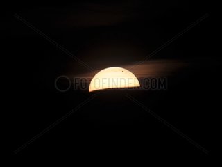 Transit of Venus across the Sun at sunrise