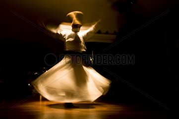 Mevlevi Sufi swirling dervishes at a folkloric show Istanbul