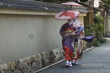 Maiko walking in the street at Kyoto Japan