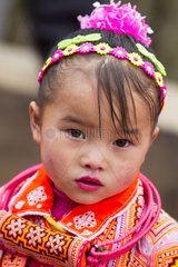 Long Horn Miao girl in traditional clothes - Guizhou China