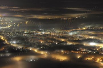 Fog and light pollution on the city of Geneva Switzerland