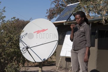 Guard and satellite antenna Kalahari Plains Camp Botswana