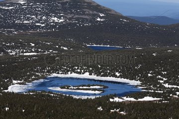 Rene lake partially frozen Gaspe Canada