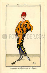 Woman in a cape of polecat fur with a fox fur collar.