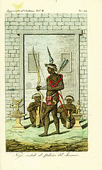 Tattooed or scarified guards at the door to the Queen's Palace  Tandi  Angola.