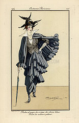 Woman in dress and cape of bleu crepe de chine.