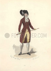 Man in large black bicorn hat  white cravat  brown coat over cream breeches  holding a cane. Man in large black bicorn hat  era of Marie Antoinette.