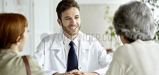 Doctor talking with senior patient