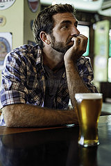 Man sitting in beer bar