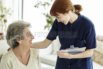 Nurse talking to patient