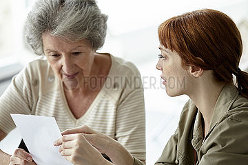 Mother and daughter discussing over prescription
