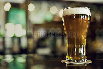 Beer glass on table