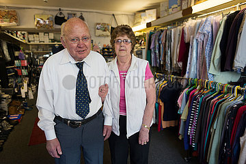 old couple running a clothes shop in cushendall  Northern ireland.