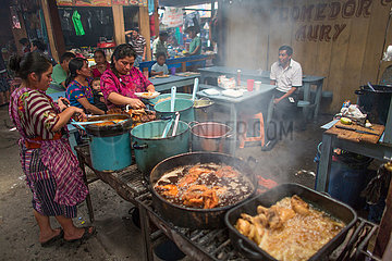 cook at work in quatamala city market