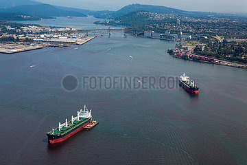 Cargo ships at vancouver harbor