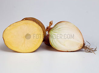 Cross section potato and onion on white background